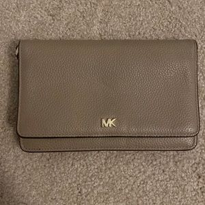 Michael Kors wallet with phone pocket and crossbody strap